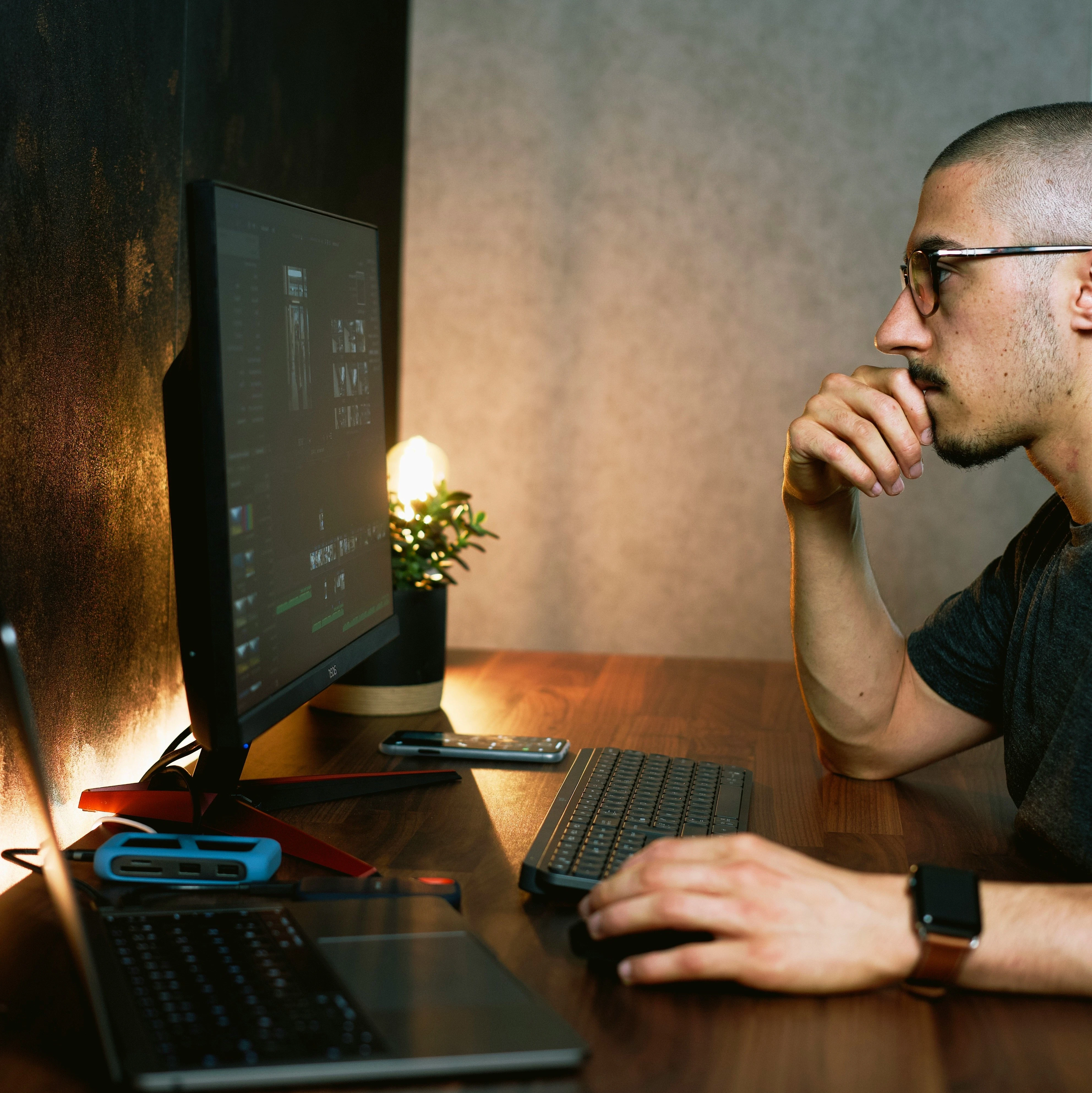 Employee working intently in a modern office